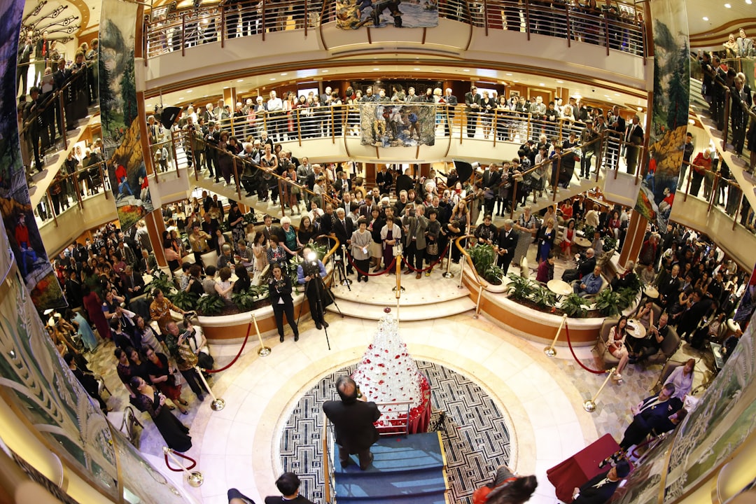 people-sitting-on-chairs-inside-building-1qo5apffcp0